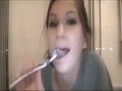 Nasty gal plays with her pointer sisters while cleaning her teeth 